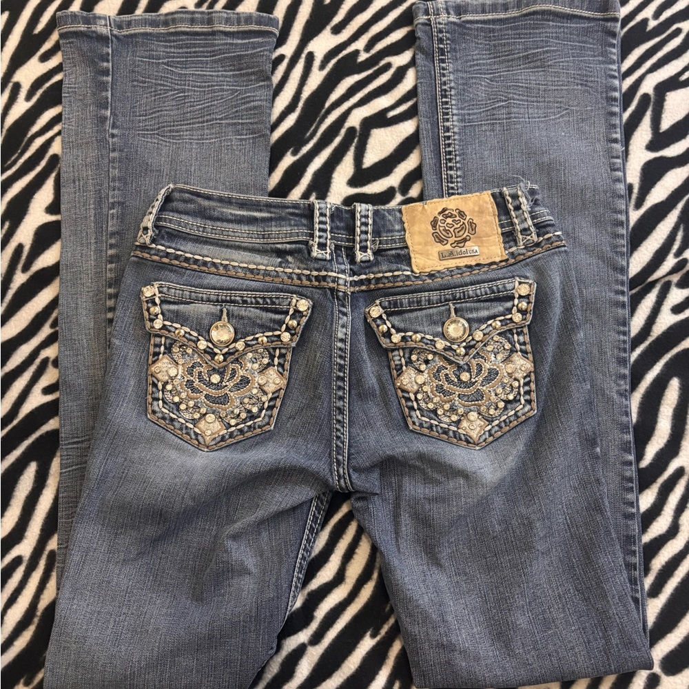 L.A idol low rise flared rhinestone jeans